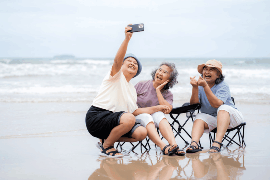 Three friends taking a selfie on the beach